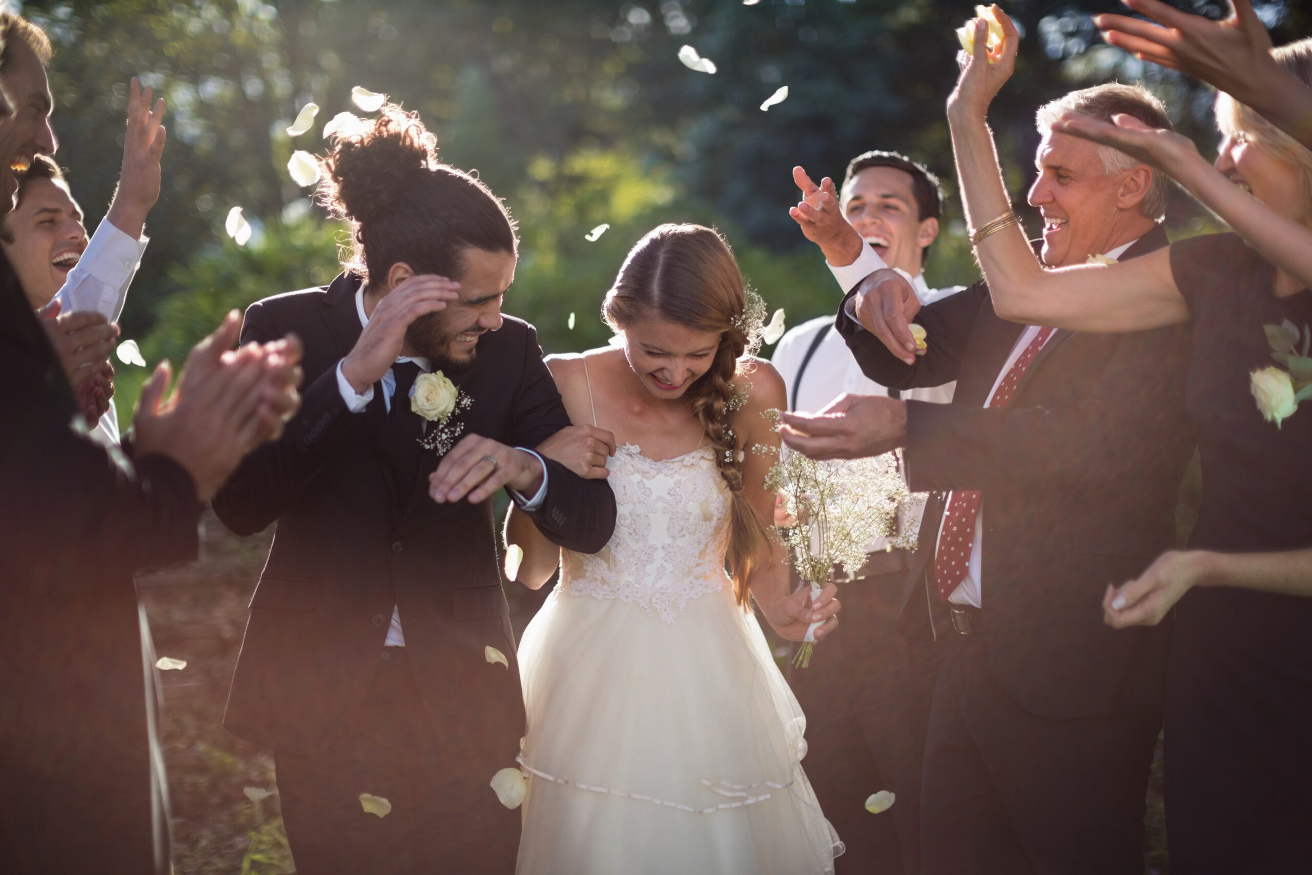 Happy couple walking hand in hand during wedding